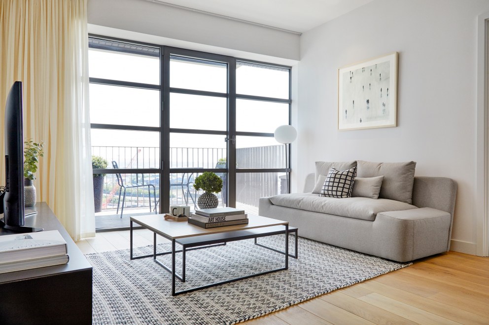 Sleek & Industrial Styled London City Island Apartment | Living Area | Interior Designers